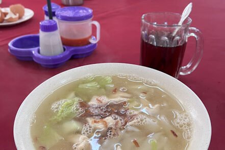 Mee hoon soup and Teh at Tahubang Restaurant, pre-hike breakfast before Mount Kinabalu climb Sabah Malaysia. © SlowingwithT.com