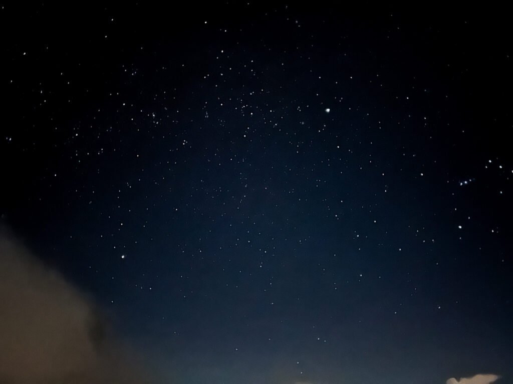 Starry night sky viewed from Laban Rata balcony at 9pm during cold mountain stargazing. © SlowingwithT.com