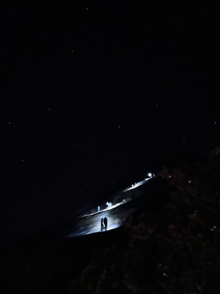 Trekkers hiking up Mount Kinabalu summit at predawn. © SlowingwithT.com